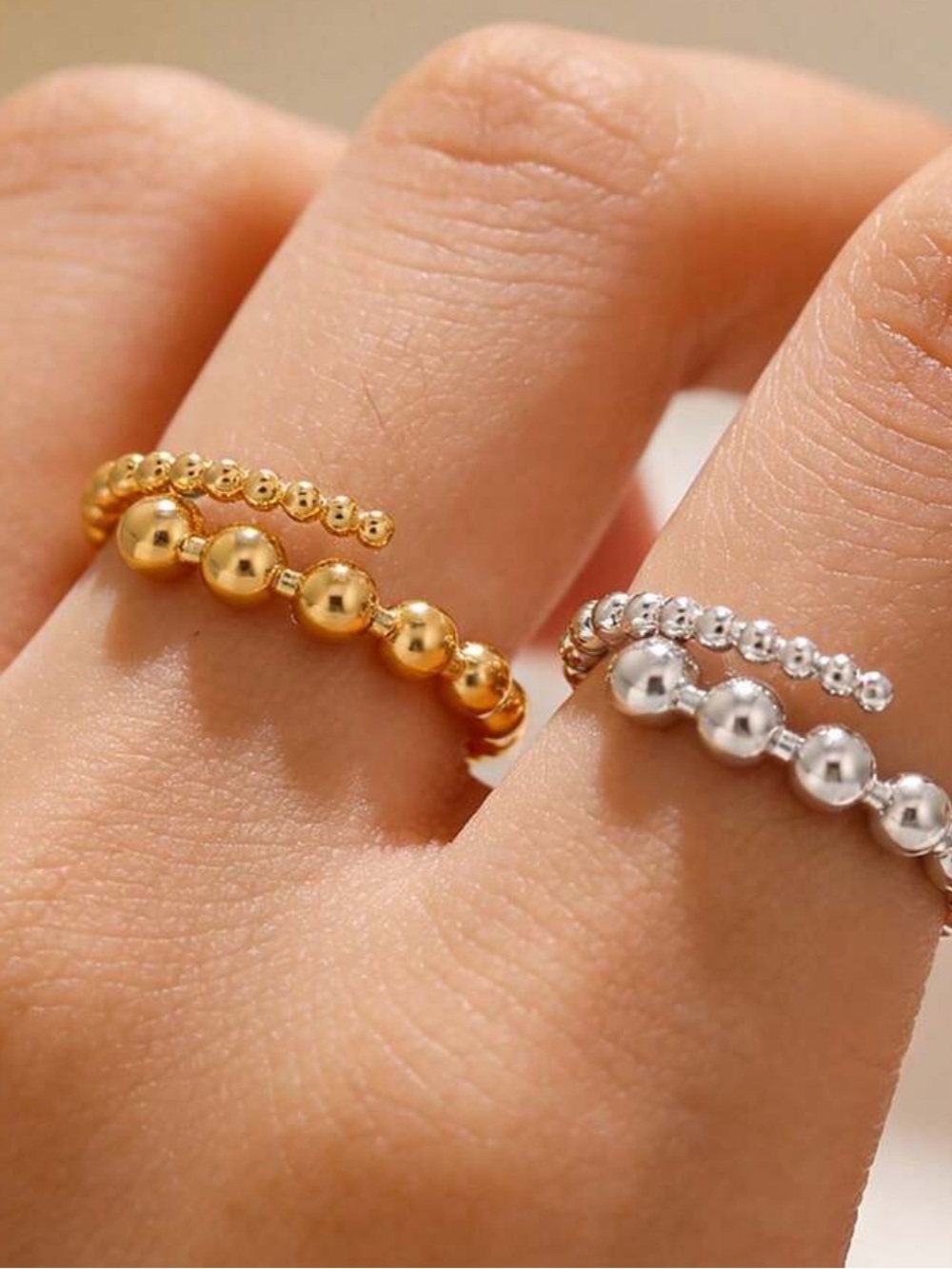 New in Package Gold tone bead ring adjustable Size 7. Italian style.
